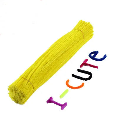 Yellow chenille stem craft set with the word cute spelled out in colorful pipe cleaners