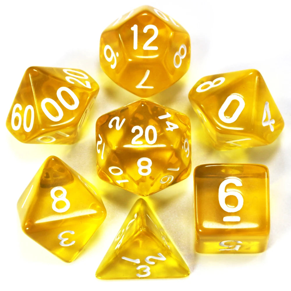 A collection of yellow acrylic dice, including a d12, d20, and d6, scattered on a white surface.