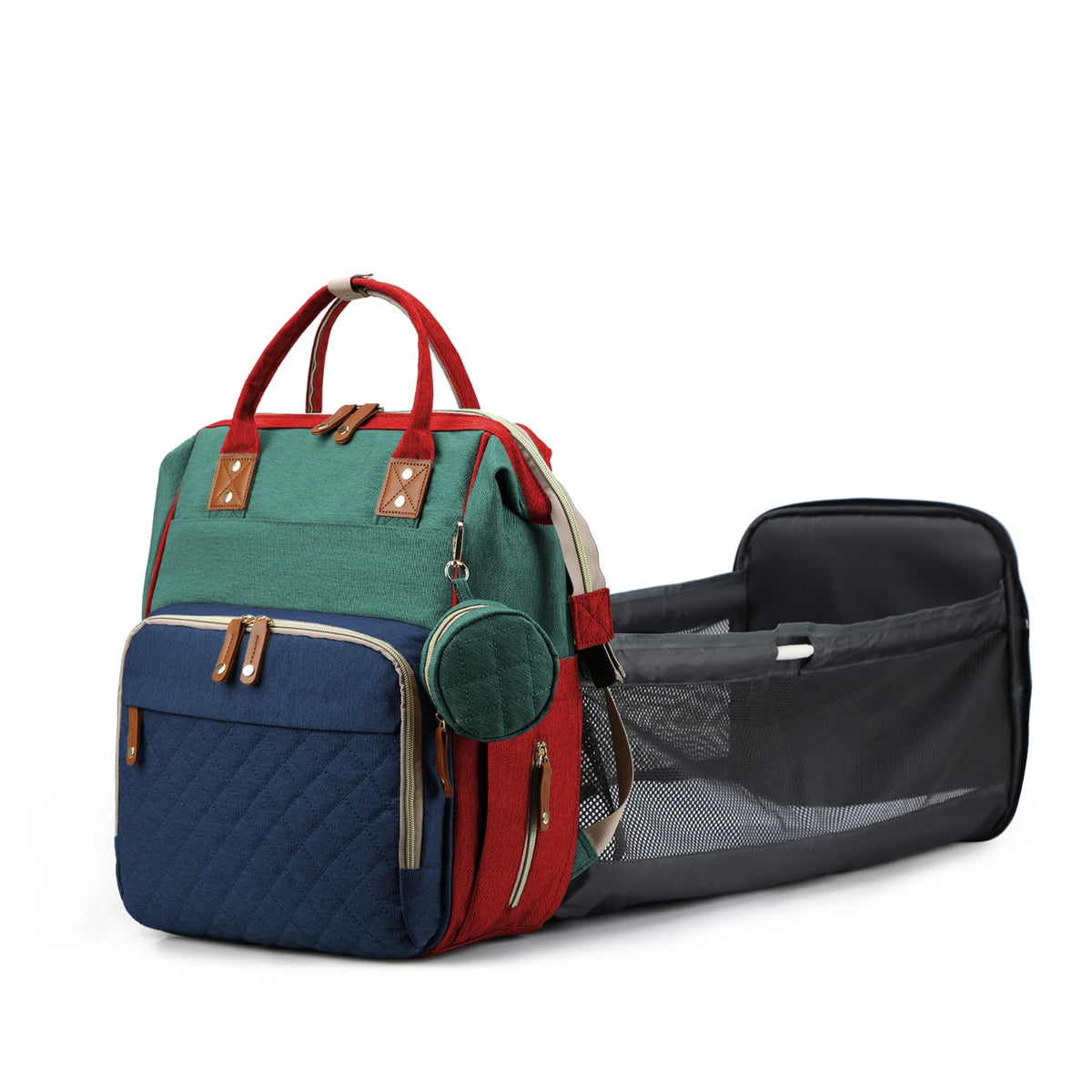 A green and blue diaper backpack with red accents and a built-in changing station.