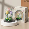 A box of 174 pieces of DIY micro building blocks forming an eternal flower garden with a dust cover.