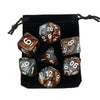A set of polyhedral dice, including d10s and d20s, stored in a black fabric bag.