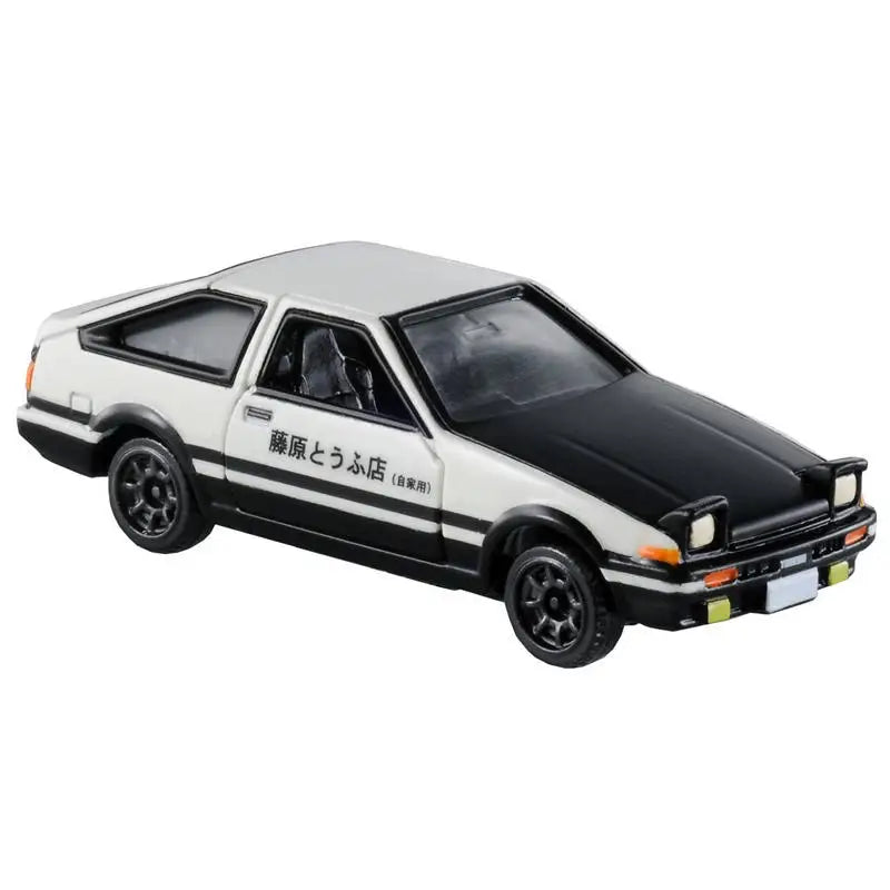 A white and black die-cast sports car model with a hatchback design.