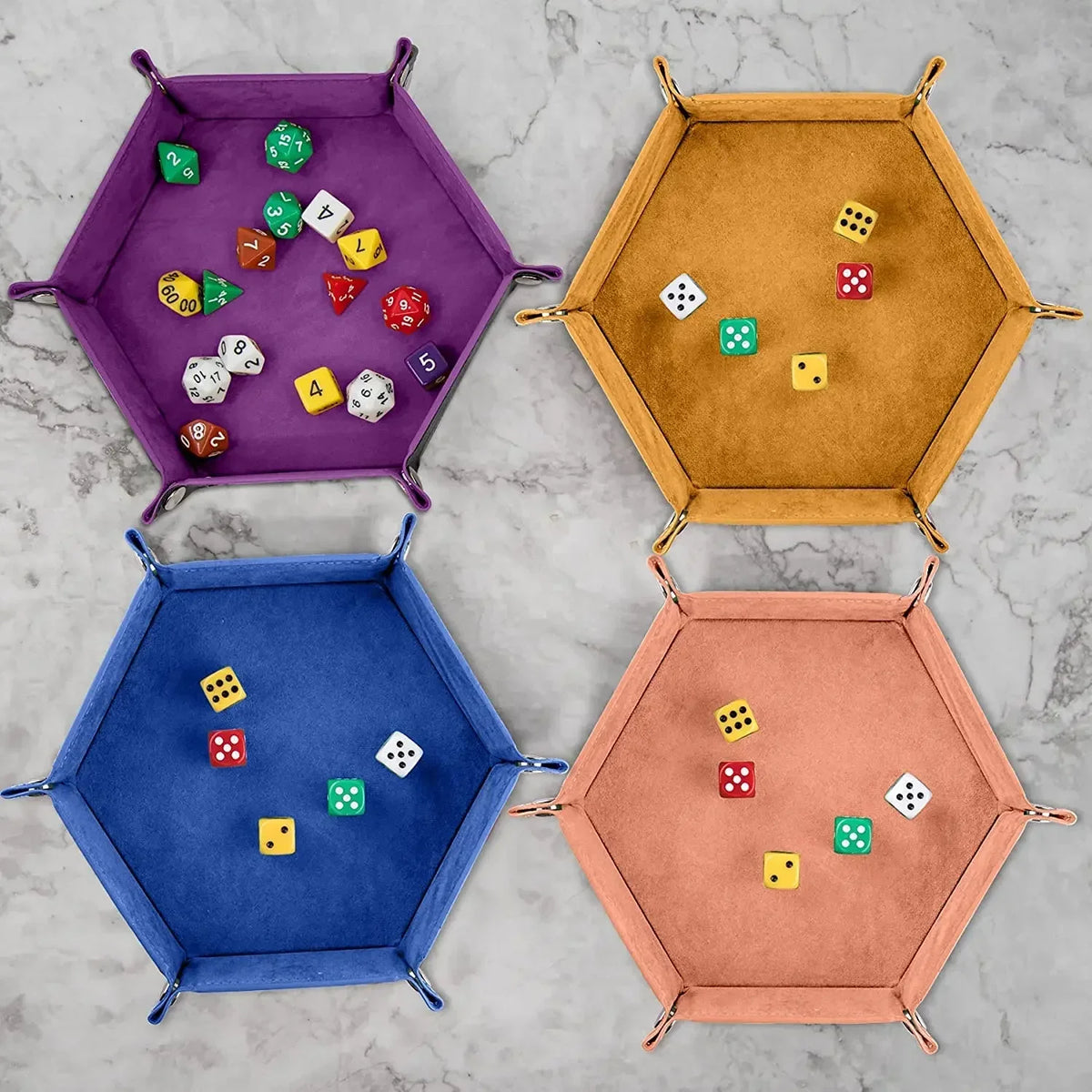 Four hexagonal folding dice trays in purple, orange, blue, and peach colors, each containing various colored dice.