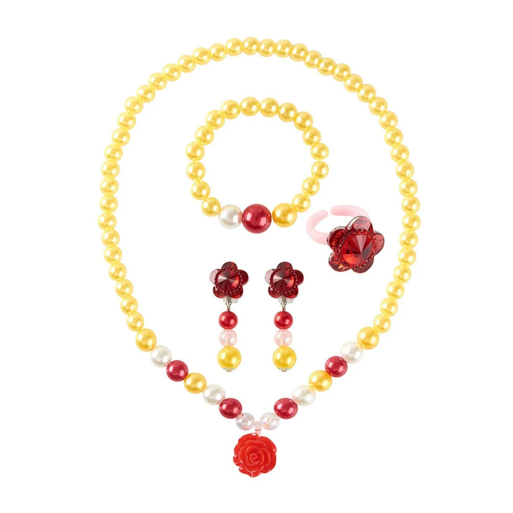 A set of golden beaded necklaces and a red flower pendant for a kids dress-up accessory.