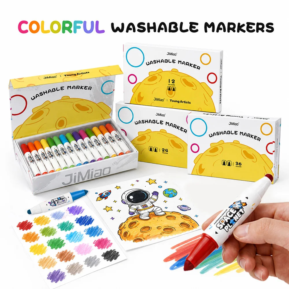 A set of colorful washable markers and a sheet of paper featuring a space theme illustration.