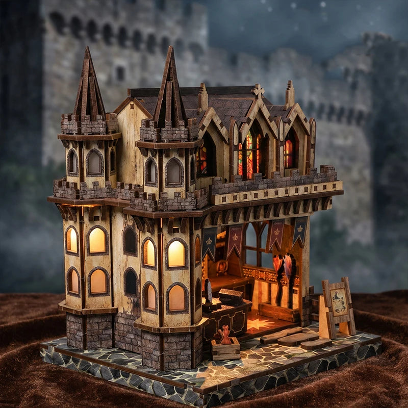 A detailed miniature kit of a wooden magic store cottage with furniture and architectural features.