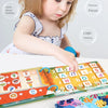 A toddler is interacting with a Montessori quiet book featuring colorful letters and reusable stickers.