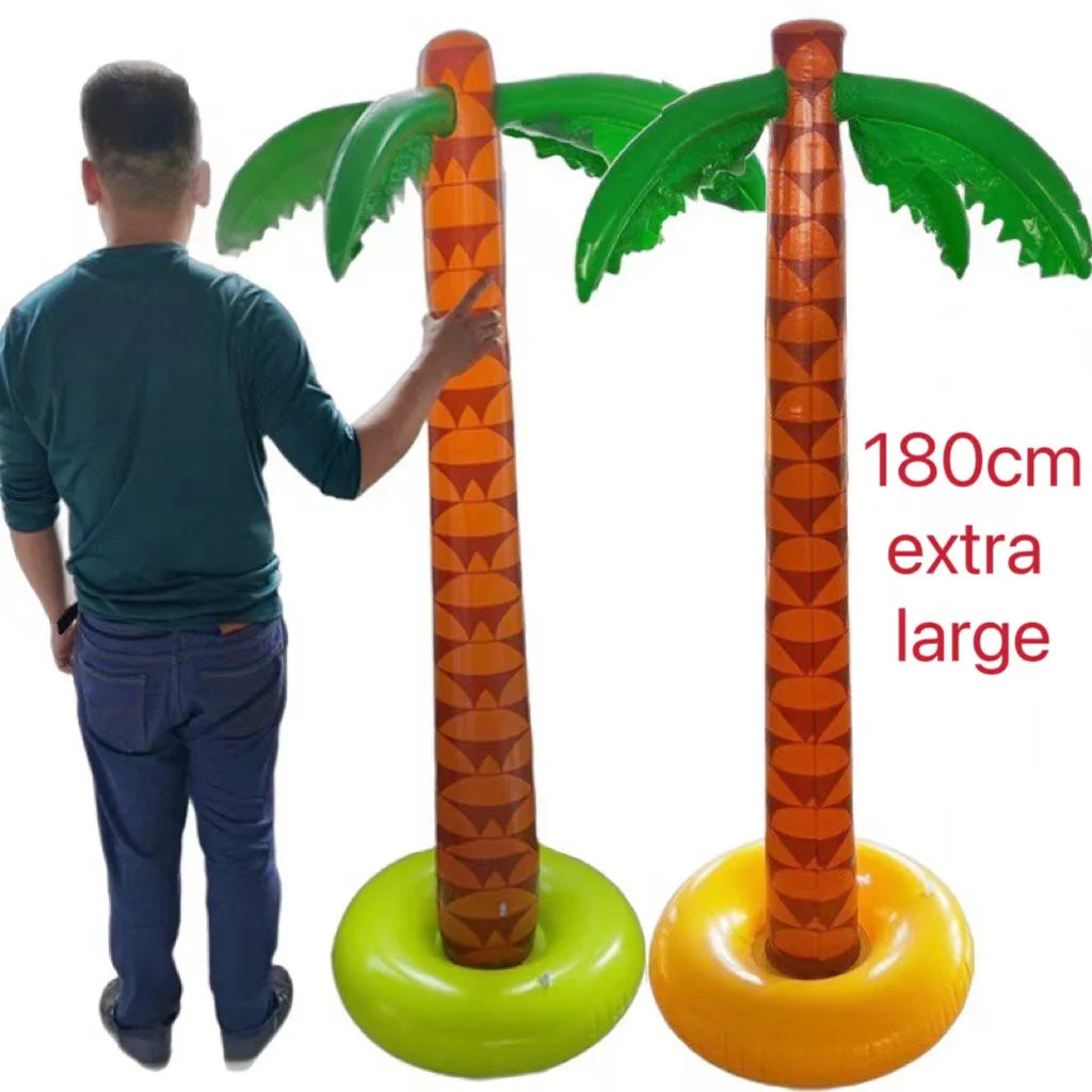 An orange inflatable palm tree with green fronds is shown next to a larger yellow version.