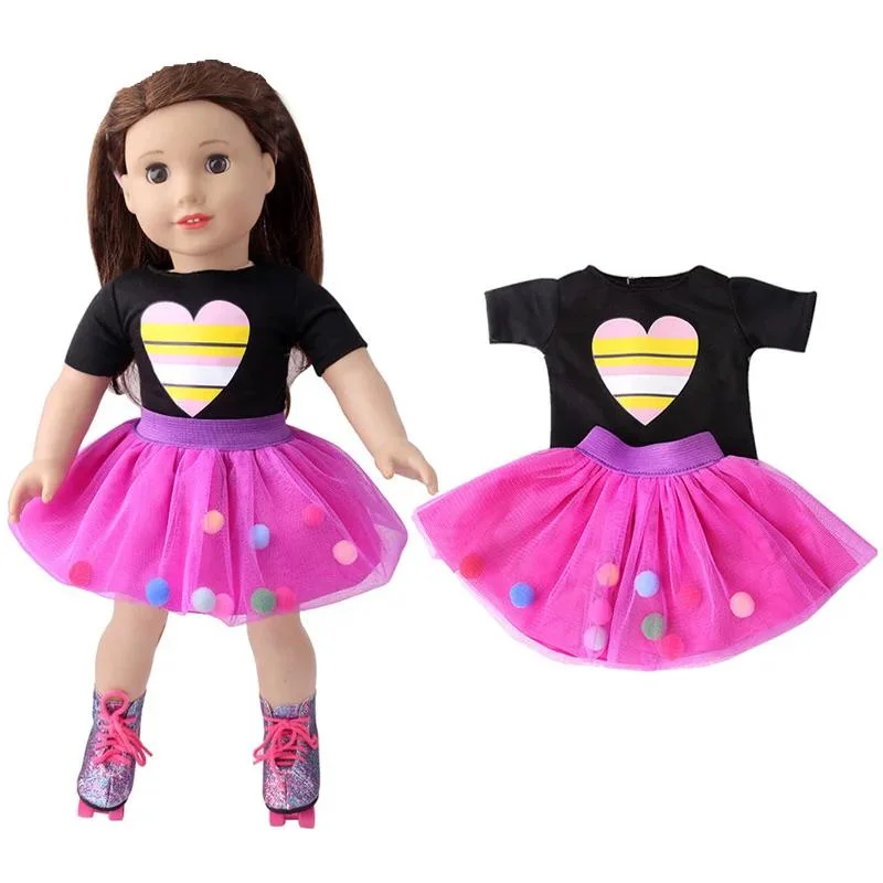 A doll wearing a black top with a heart design, a pink tutu skirt, and sparkly tights.