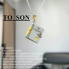 Silver and gold engraved pendant necklace set with 'Mi Campeón' and a dove charm for a son.