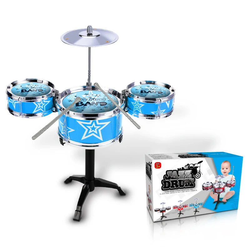 A blue plastic kids jazz drum set with a stand and multiple drums is shown on a white background.