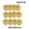 Twelve pieces of golden artificial tropical palm leaves measuring 20x26cm for party decor
