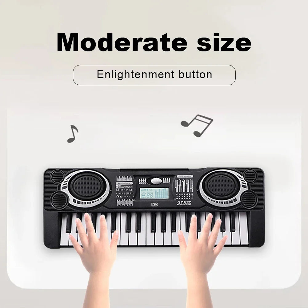 A person's hands are playing a black 37-key electronic keyboard with a microphone on a white surface.