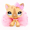 A light orange miniature cat figure with pink accents and a pink bow, displayed against a white background.