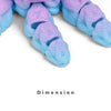 A close-up view of a set of purple and blue 3D printed articulated octopus fridge magnets.