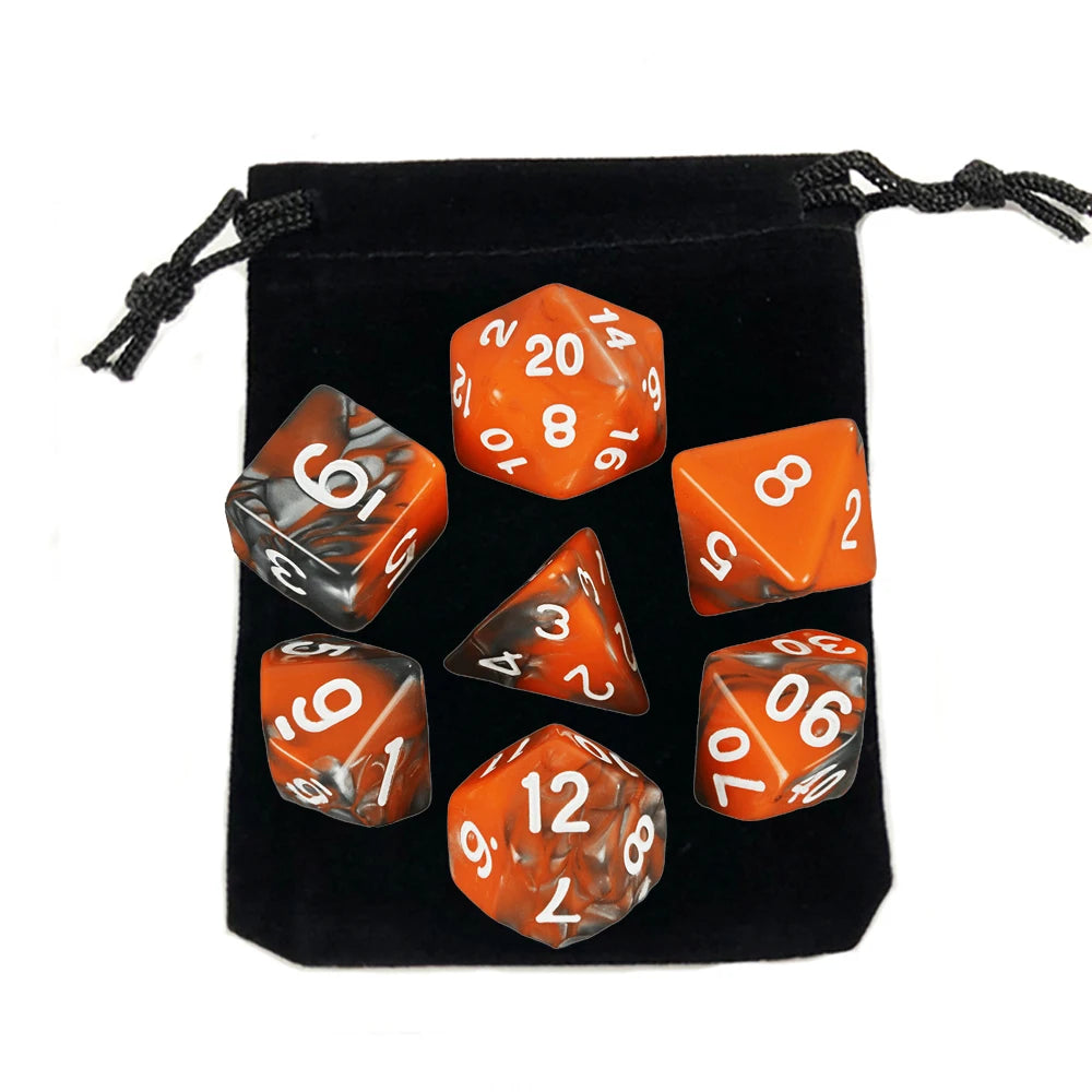 A black storage bag containing a set of polyhedral dice, including a twenty-sided die and other dice.