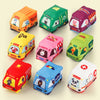 A collection of colorful soft fabric car toys in various colors and themes like transport, school, taxi, and ambulance.
