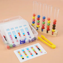 A set of wooden clip beads in various colors is displayed alongside a test tube toy and a color sorting mat.