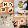 A collection of blank wood squares with letters like HOME and JUSTIN used for DIY crafts and engraving