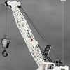 Large-sized white spray crane truck with a long boom and a large bucket, shown against a gray background.