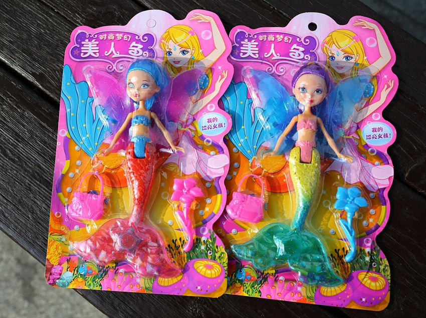 A set of two mermaid princess dolls with colorful tails and wings for imaginative play.