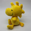 A yellow Snoopy and Woodstock plush set featuring a smiling dog and bird, displayed against a white background.