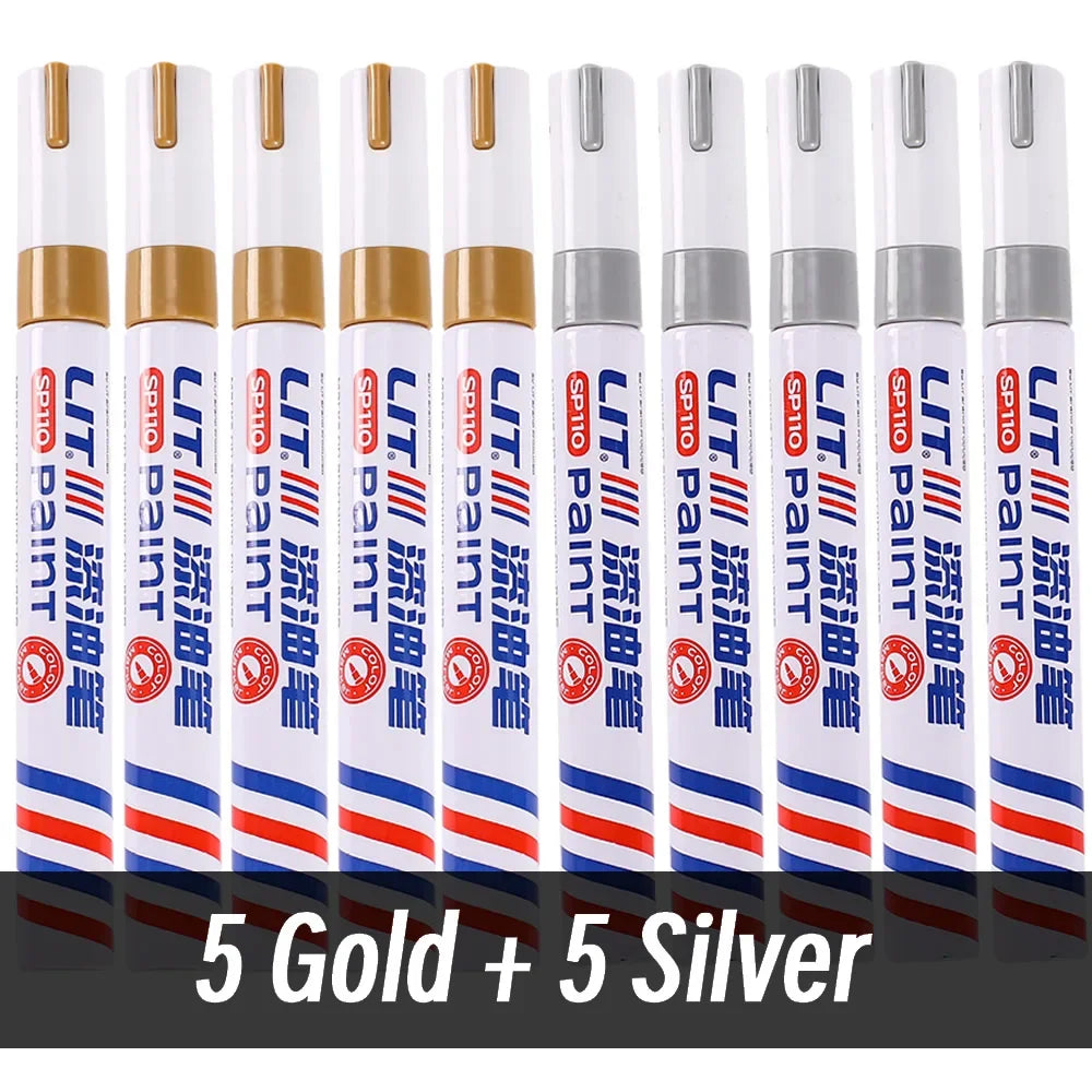 A set of ten permanent paint markers in gold and silver colors arranged in a row.