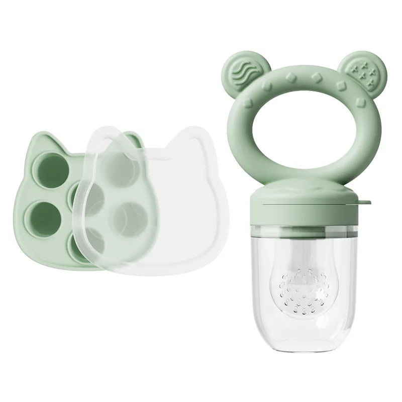 A silicone baby fruit feeder set with freezer molds featuring a green bear-shaped handle and a clear container.
