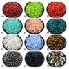 A collection of thirty different colors and shades of acrylic round beads for jewelry making.