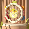A pink and yellow baby musical instrument set featuring a hand drum and shake rattle for toddlers.
