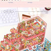 A sticker pack featuring a whimsical cartoon penguin and dog RV scene, depicting an interior view of a brightly colored vehic
