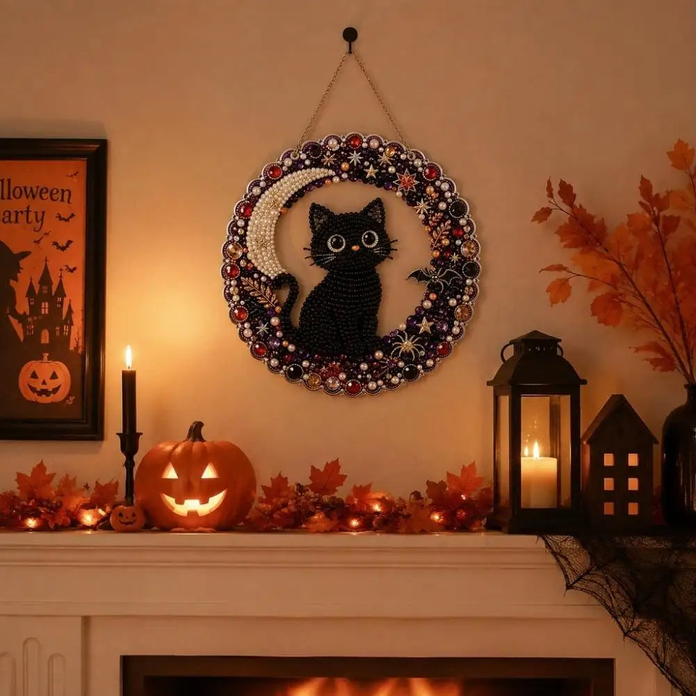 A decorative Halloween diamond painting hanging ornament kit featuring a black cat in an ornate wreath displayed above a fire
