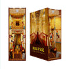 A wooden DIY book nook kit featuring an elaborate historical interior with LED lighting and a dust cover.