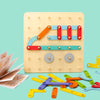 A wooden Montessori pegboard puzzle set with colorful wooden pegs and a light yellow background.