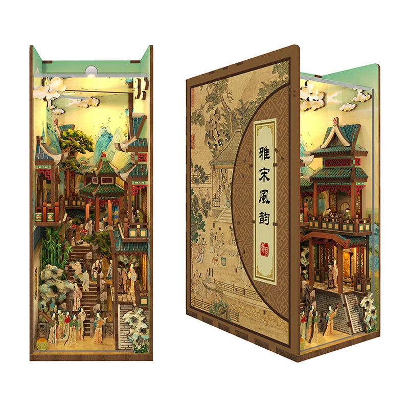 A DIY book nook kit featuring a detailed miniature scene with traditional architecture and LED lighting.