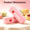 Pink strawberry shaped butter squishy toy with dimensions shown next to a muffin and a biscuit.