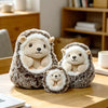 Three adorable hedgehog plush pillows in brown and cream colors resting on a wooden surface.