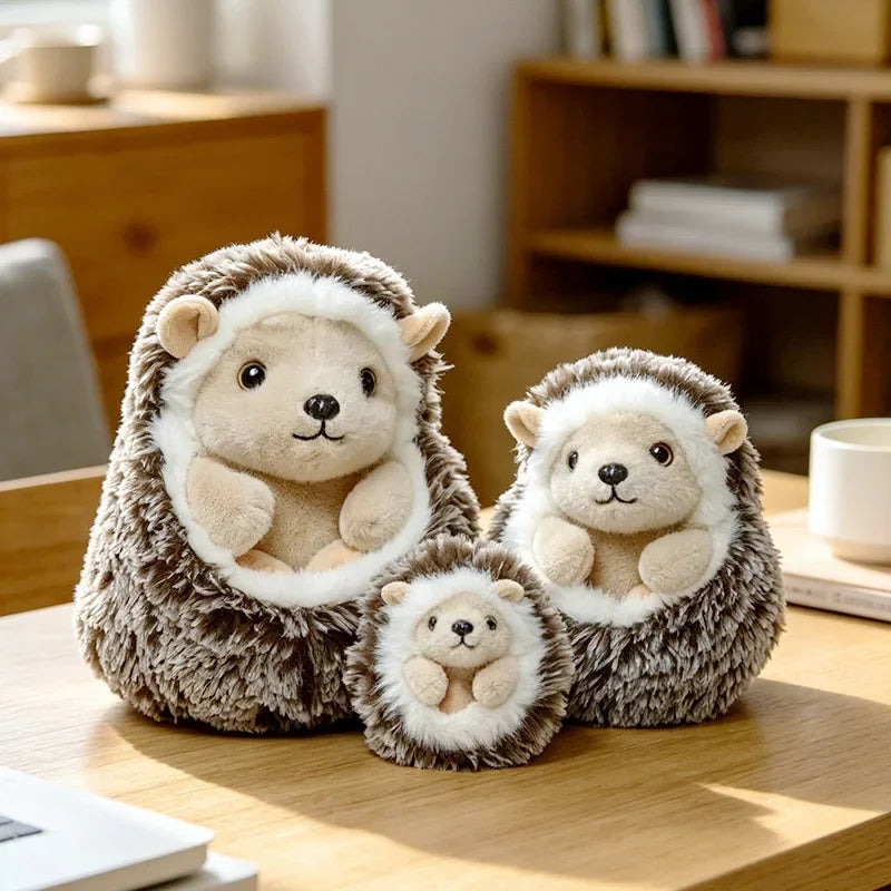 Three adorable hedgehog plush pillows in brown and cream colors resting on a wooden surface.