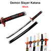 A Demon Slayer Katana replica sword with a black handle and silver blade shown alongside other similar swords.