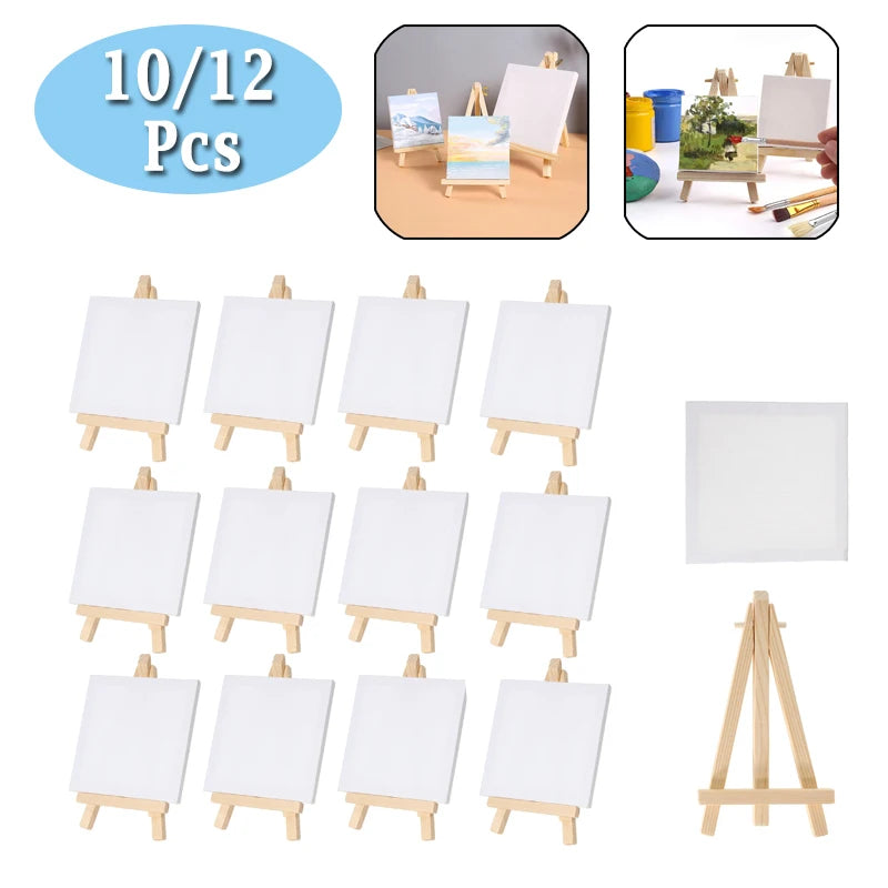 A set of twelve mini wooden easels with white canvases for kids art projects.