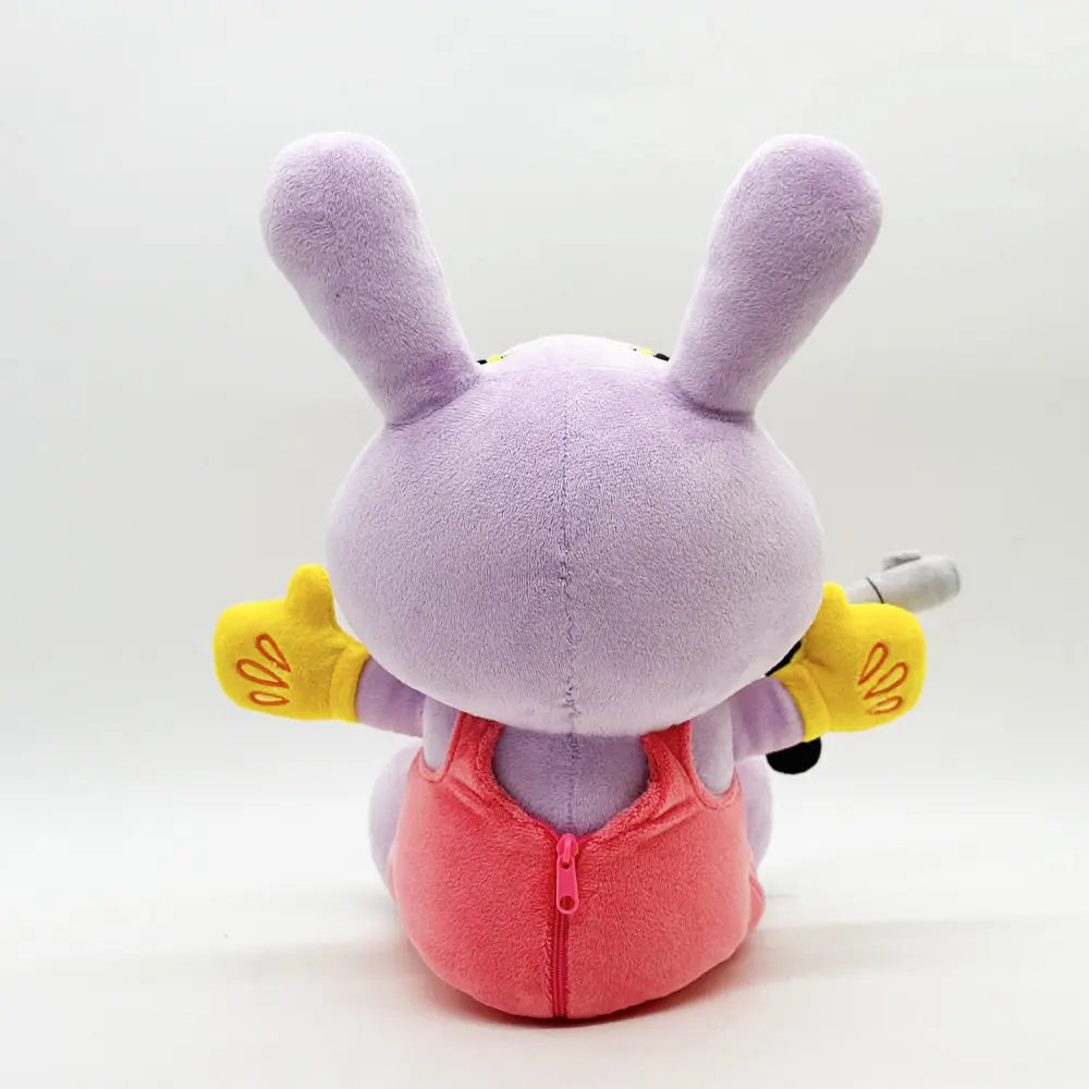 A purple plush doll with long ears and yellow gloves is shown against a white background.