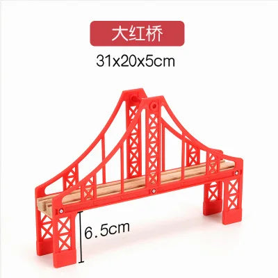 A red wooden train track accessory set featuring an airport or gas station scene, measuring 31x20x5cm.
