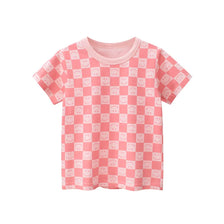 A pink short-sleeve cotton t-shirt for girls with a repeating pattern of smiling faces.