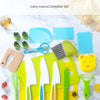 A complete set of safe plastic play knives and tools for children's kitchen use, including various shapes and colors.