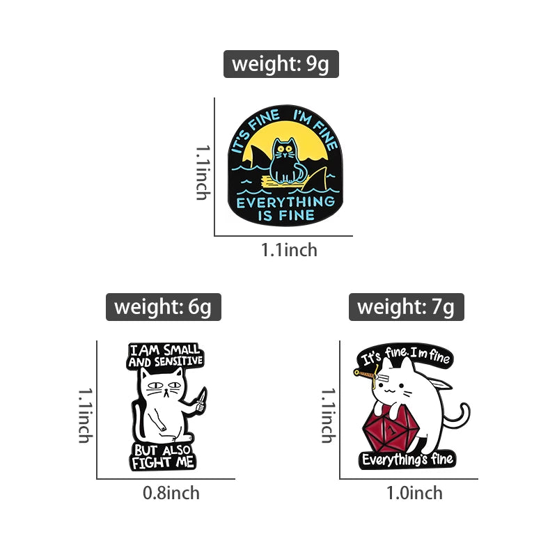 A set of four black cat enamel pins with various text designs and sizes.