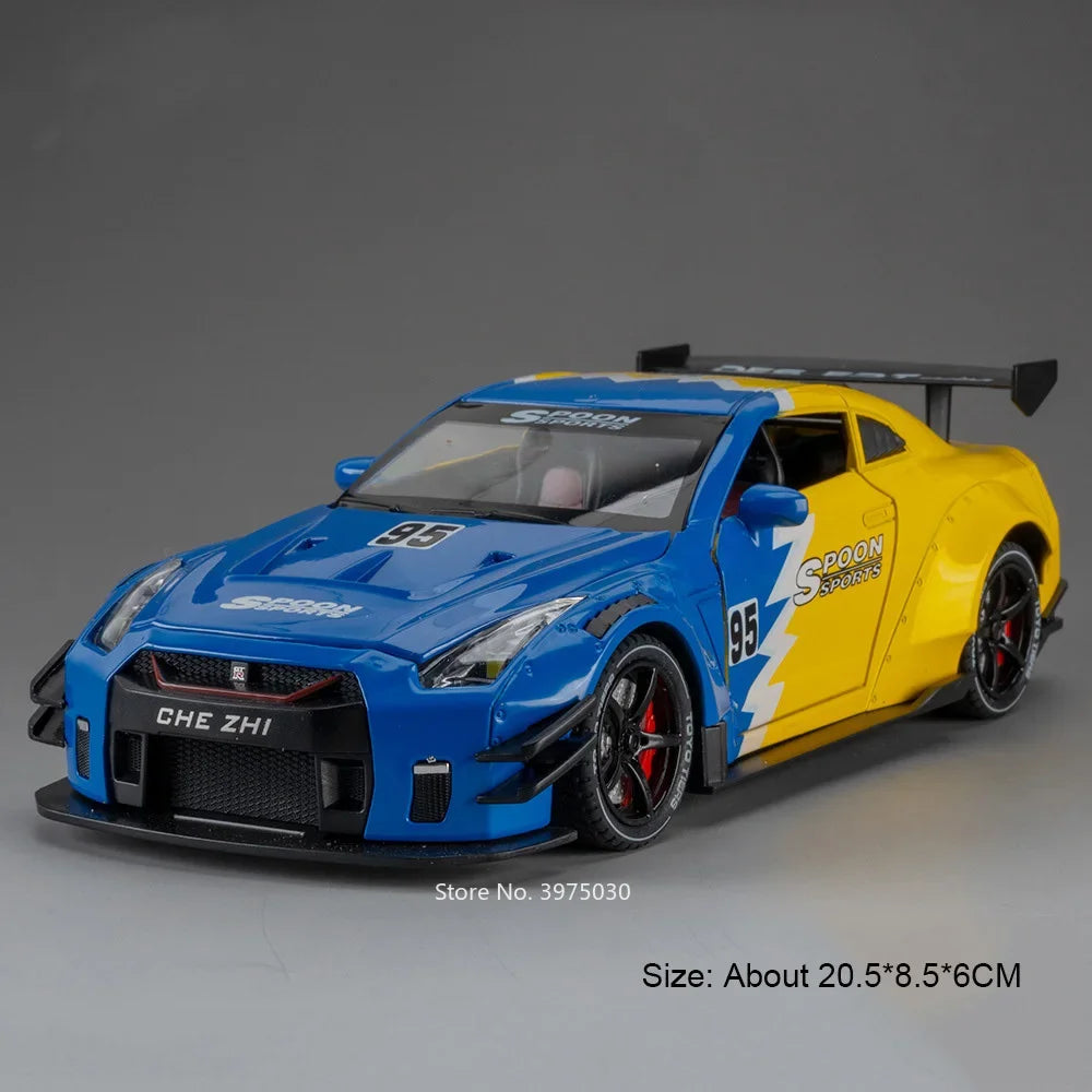 Blue and yellow 1:24 scale diecast GTR sports car model with racing livery and spoiler