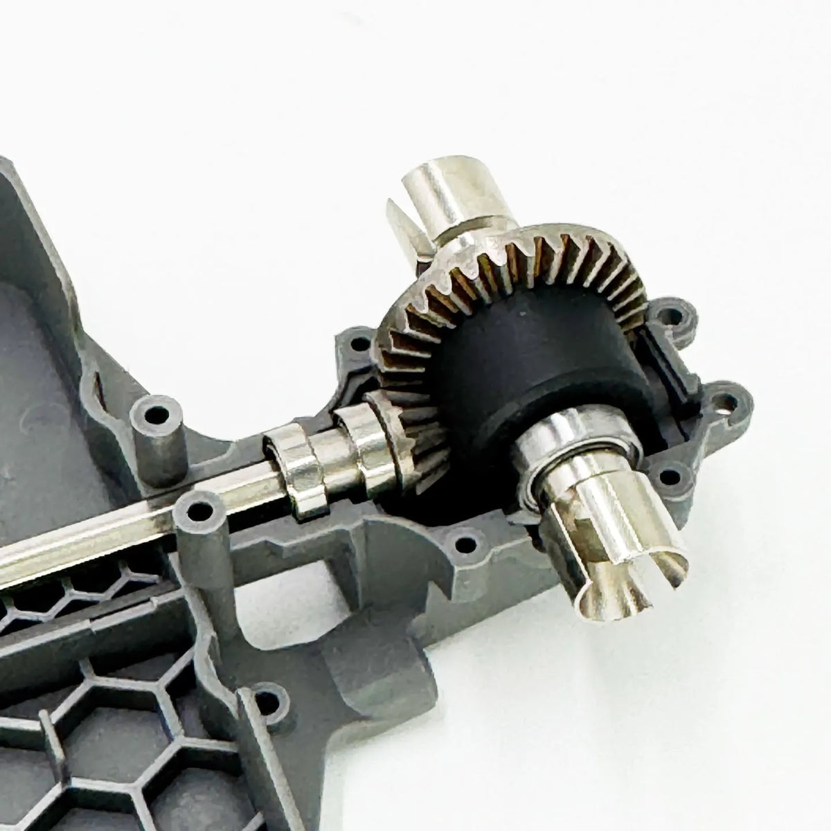 Metal gear differential upgrade kit for RC cars showing a gear assembly and shaft