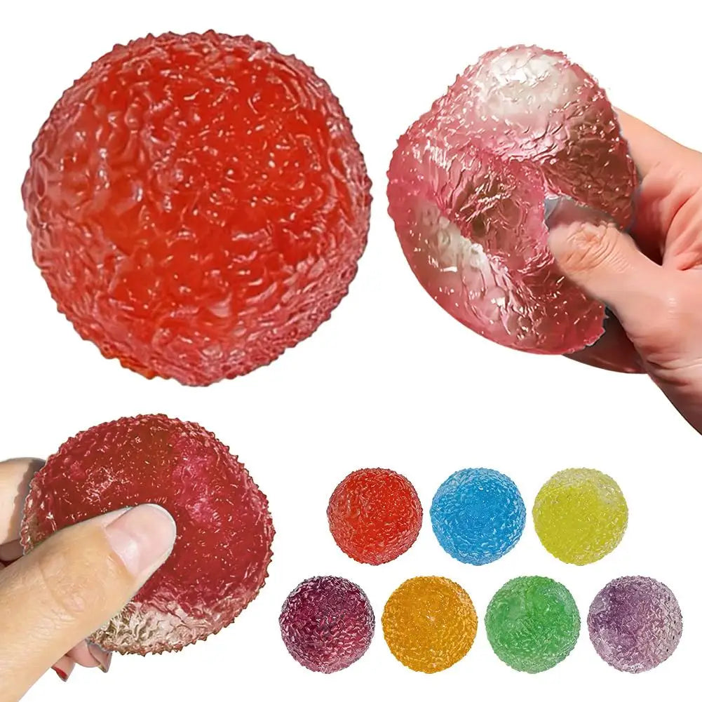 A collection of red and multi-colored soft squeeze sensory stress relief fidget balls shown in various textures and hand grip