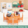 A dollhouse kitchen set featuring wooden furniture, appliances, and food items for play.