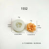 A white silicone mold for making 1552 carnation flowers, with dimensions and weight listed.